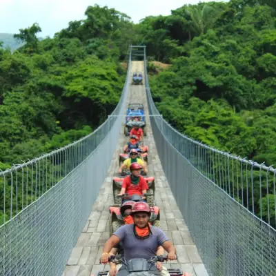 a group of people walking on Capilano Suspension Bridge