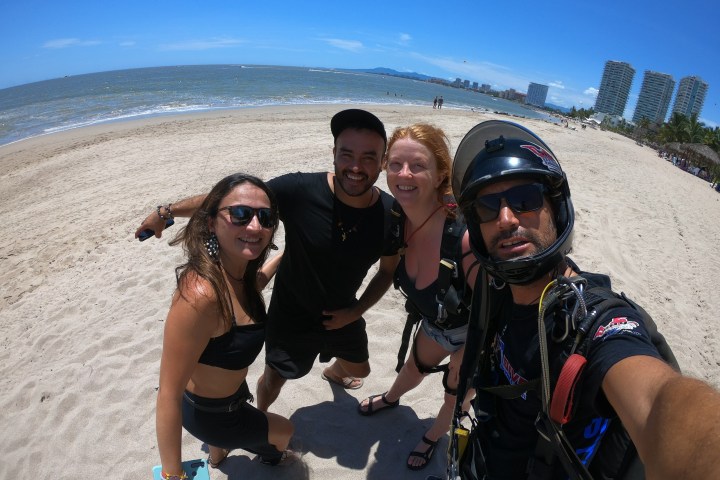 a group of people on a beach