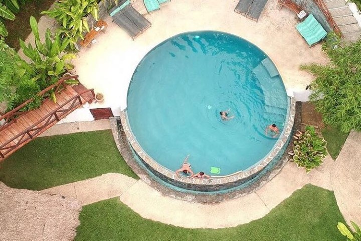 a cake sitting on top of a grass covered field