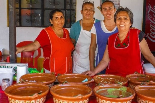 a group of people posing for the camera