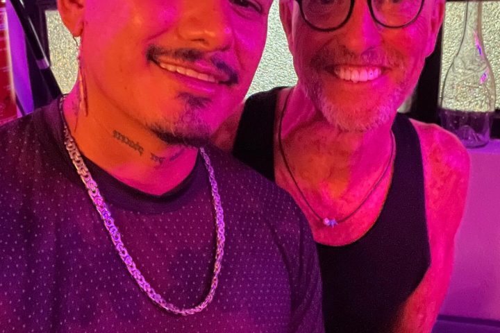 a man and a woman taking a selfie